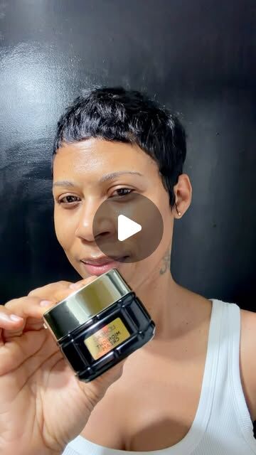 Chaniel holding L'Oréal Paris Midnight Cream